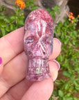 Pink and Blue Tourmaline Palm Skull by Igor de Souza