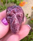 Pink Tourmaline Palm Skull by Igor de Souza