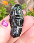 Green Tourmaline Palm Skull by Igor de Souza