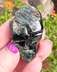 Green Tourmaline Palm Skull by Igor de Souza