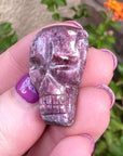 Pink Tourmaline Palm Skull by Igor de Souza