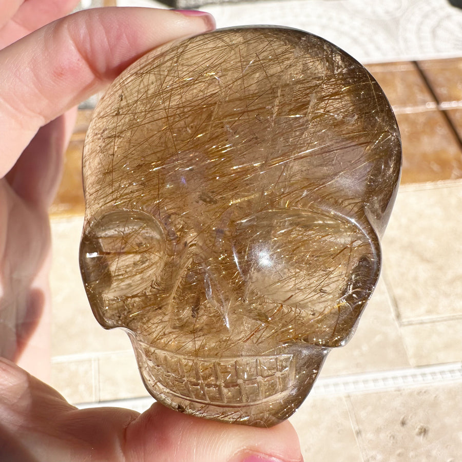 Golden Rutile Citrine Quartz Palm Crystal Skull Carved by Leandro de Souza