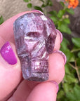 Pink Tourmaline Palm Skull by Igor de Souza