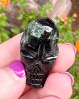 Green Tourmaline Palm Skull by Igor de Souza