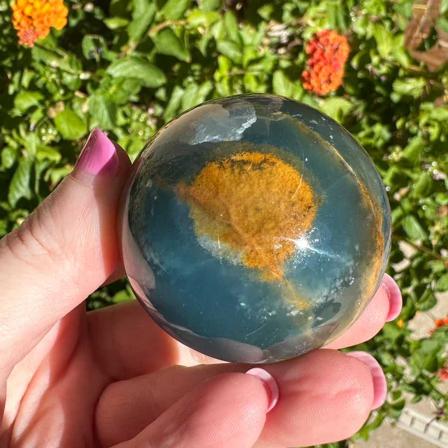 High Grade Lemurian Aquatine Calcite Crystal Sphere with Rainbow
