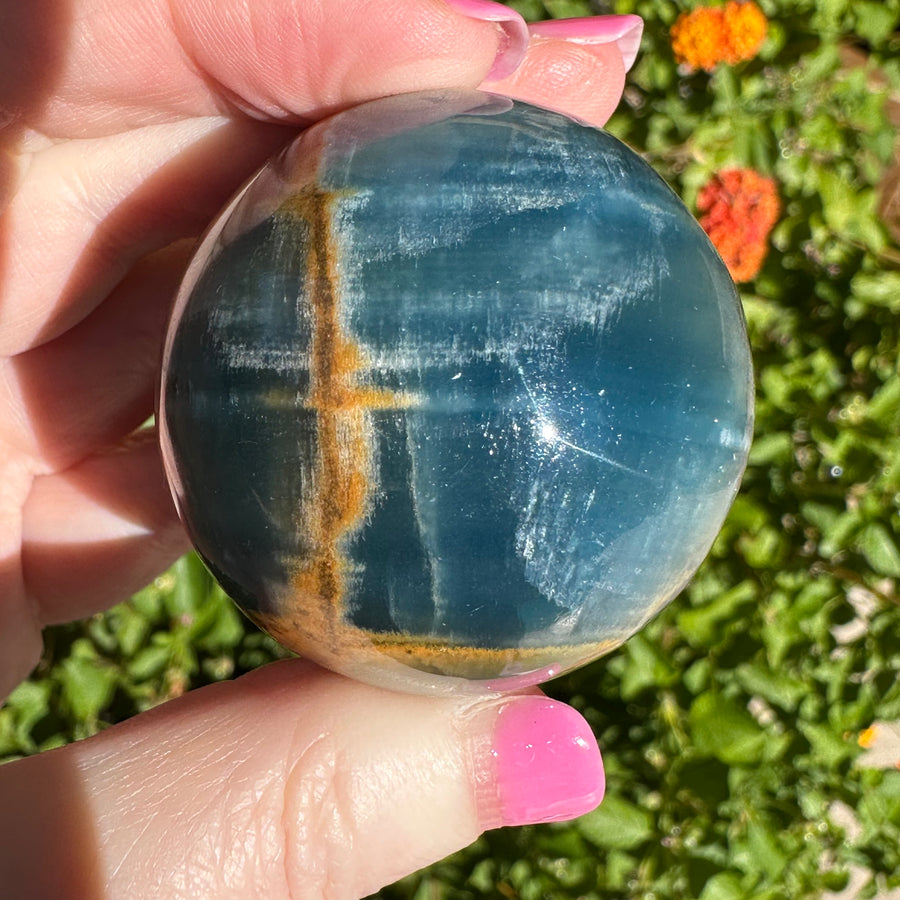 High Grade Lemurian Aquatine Calcite Crystal Sphere with Rainbow