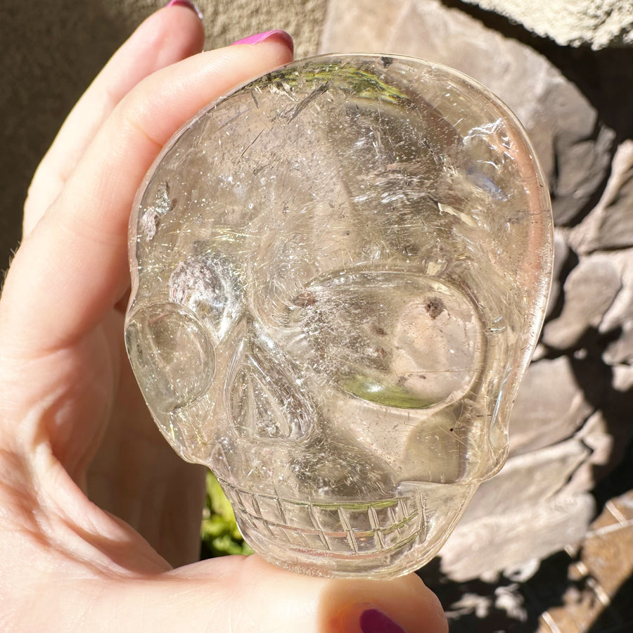 Golden Rutile and Lodolite Palm Crystal Skull Carved by Leandro de Souza