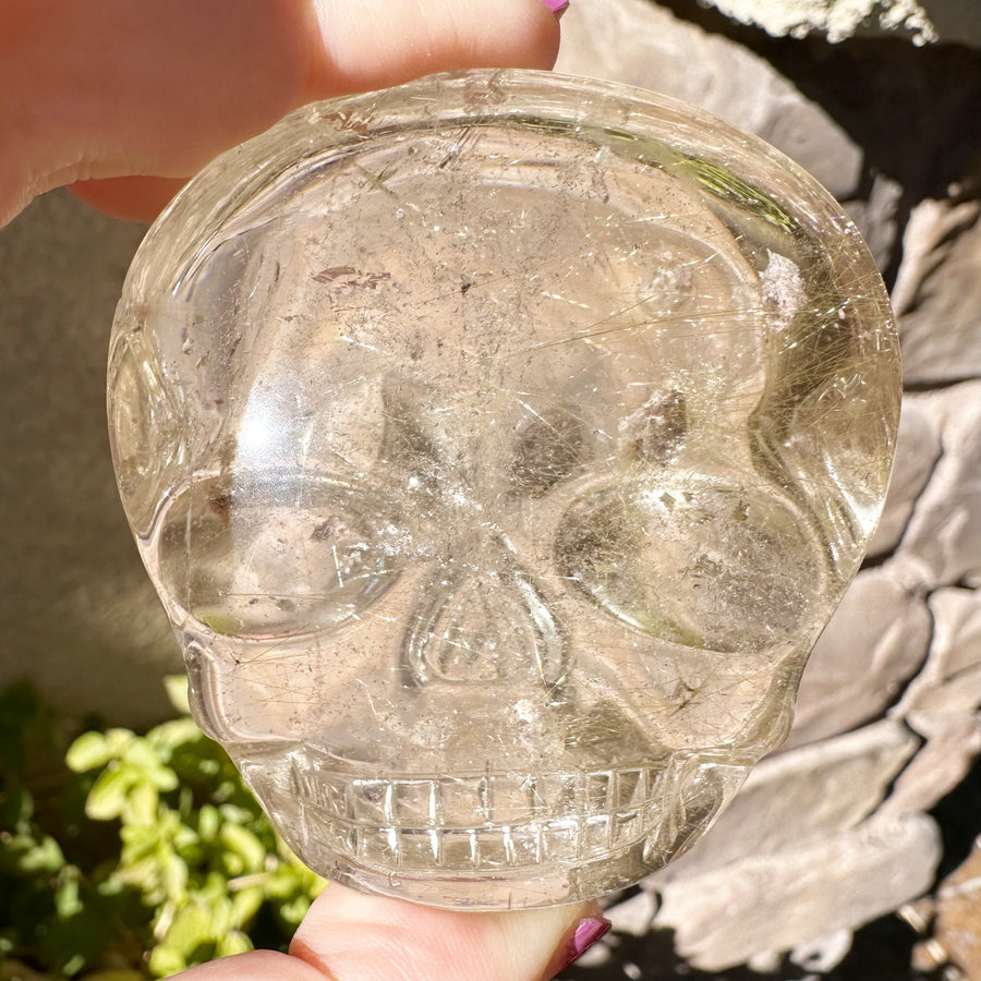 Golden Rutile and Lodolite Palm Crystal Skull Carved by Leandro de Souza