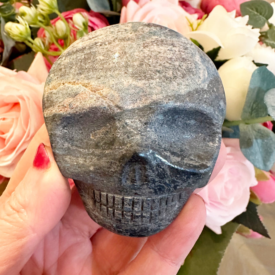 Blue Richterite Palm Crystal Skull Carved by Leandro de Souza