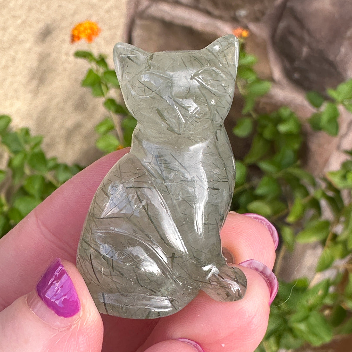 Epidote Crystal Kitten Carved by Leandro de Souza