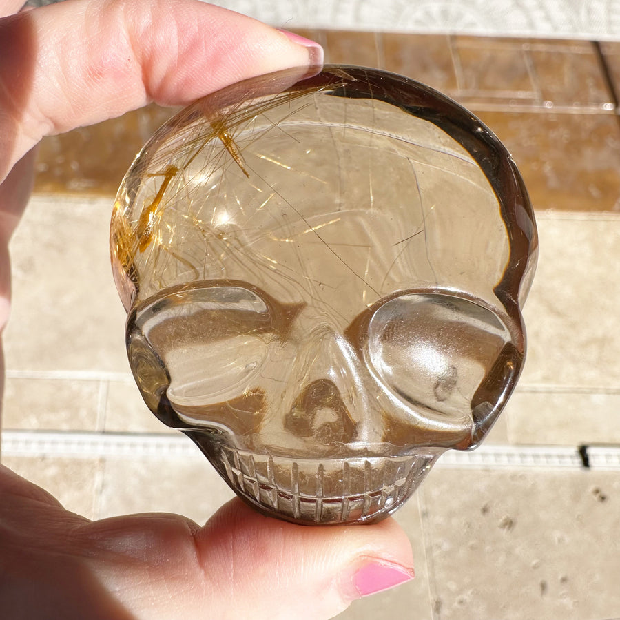 Ultra Clear Golden Rutile Citrine Quartz Palm Crystal Skull Carved by Leandro de Souza