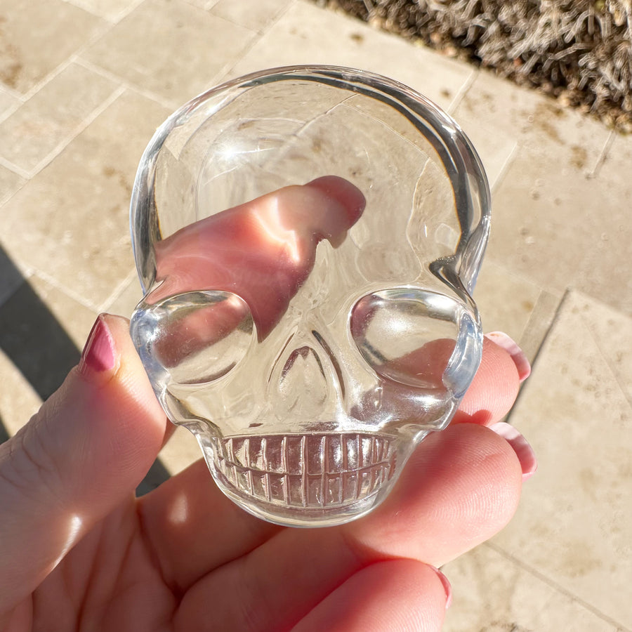 Ultra Clear Lemurian Quartz Palm Crystal Skull Carved by Leandro de Souza