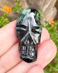 Green Tourmaline Palm Skull by Igor de Souza