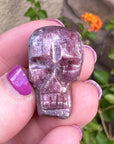 Pink Tourmaline Palm Skull by Igor de Souza