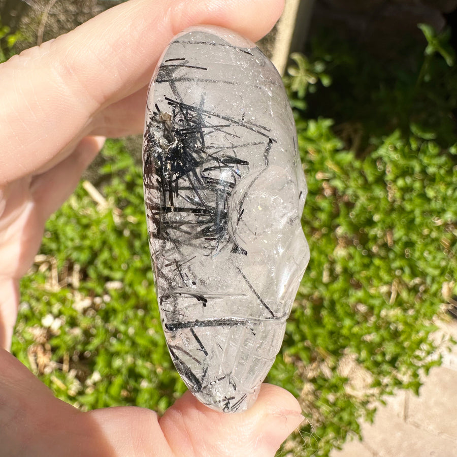 Tourmaline Rutile Palm Crystal Skull Carved by Leandro de Souza