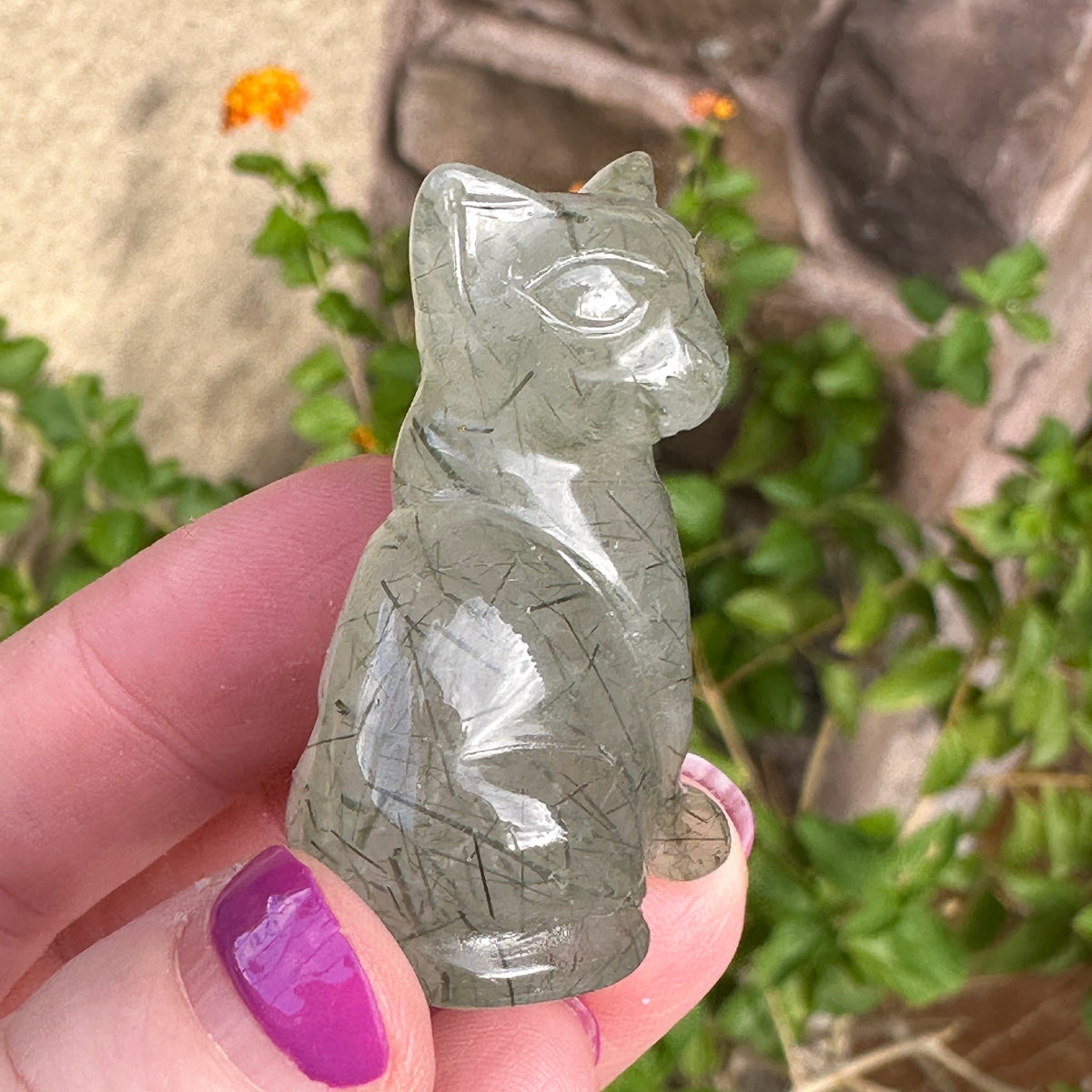 Epidote Crystal Kitten Carved by Leandro de Souza