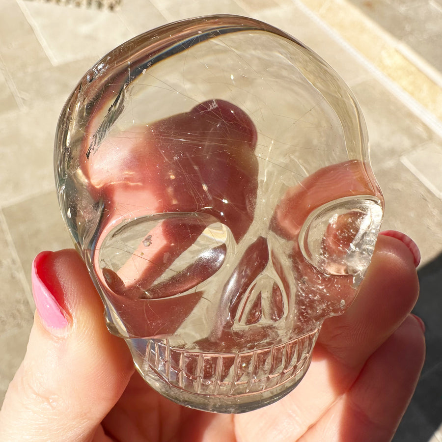 Golden Rutile Quartz Palm Crystal Skull Carved by Leandro de Souza