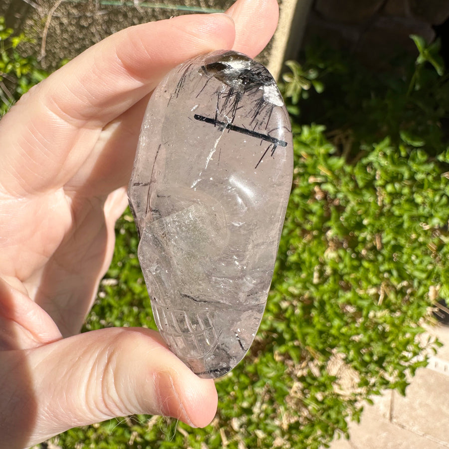 Tourmaline Rutile Palm Crystal Skull Carved by Leandro de Souza