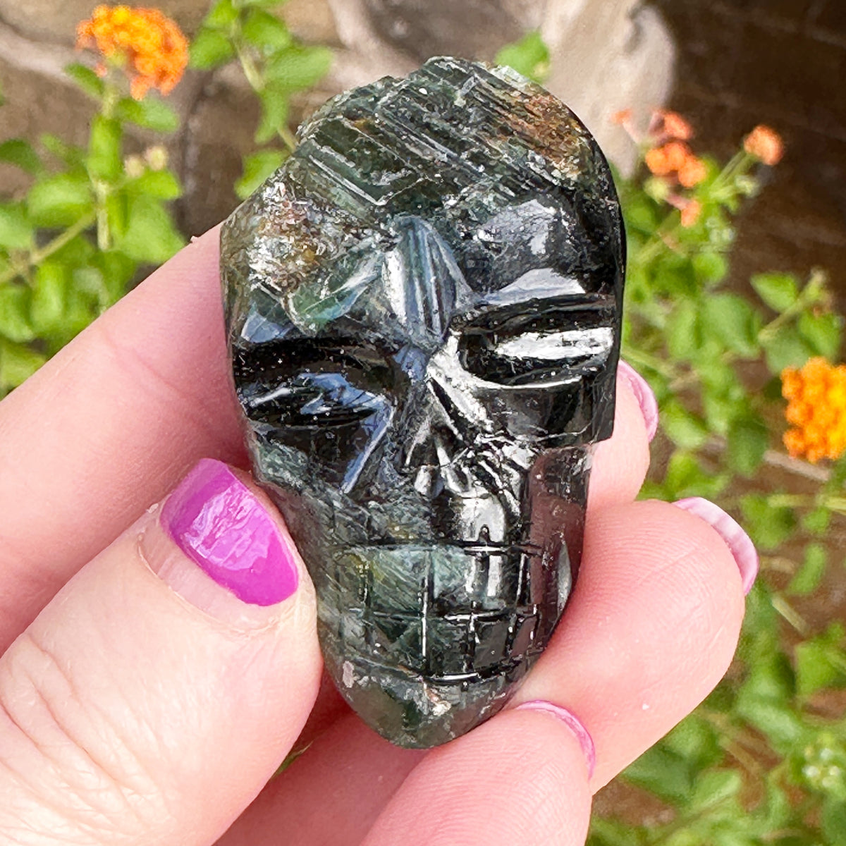 Green Tourmaline Palm Skull by Igor de Souza