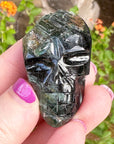 Green Tourmaline Palm Skull by Igor de Souza