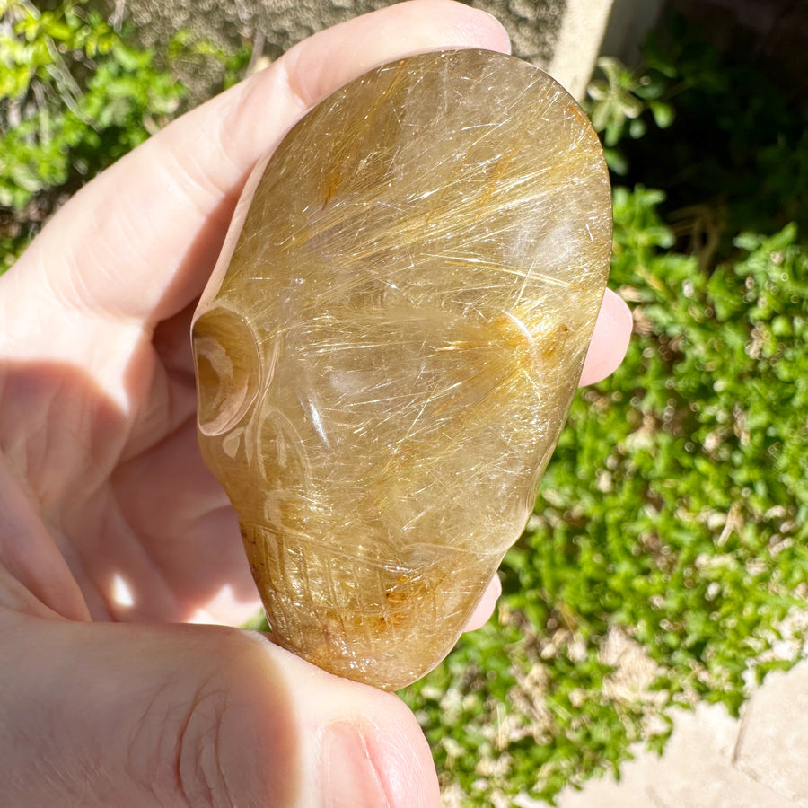 Golden Rutile Citrine Quartz Palm Crystal Skull Carved by Leandro de Souza