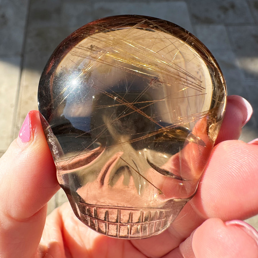 Ultra Clear Rutile Smoky Quartz Palm Crystal Skull Carved by Leandro de Souza