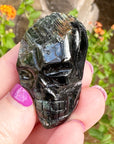 Green Tourmaline Palm Skull by Igor de Souza