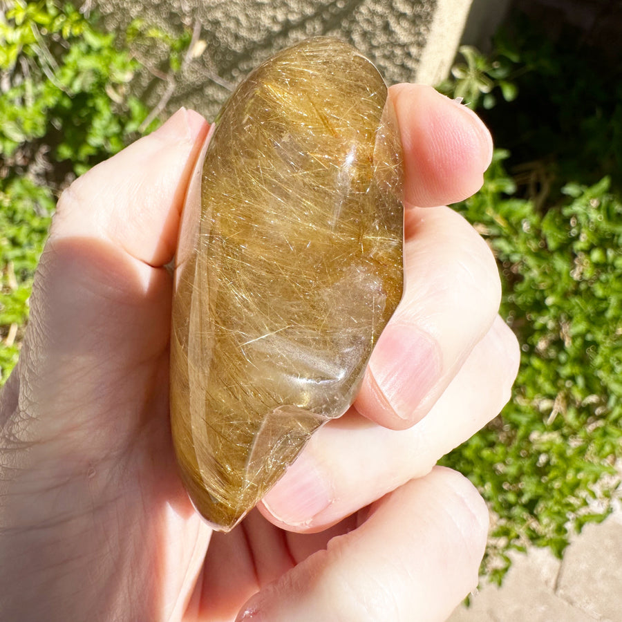 Golden Rutile Citrine Quartz Palm Crystal Skull Carved by Leandro de Souza