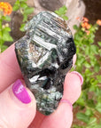 Green Tourmaline Palm Skull by Igor de Souza
