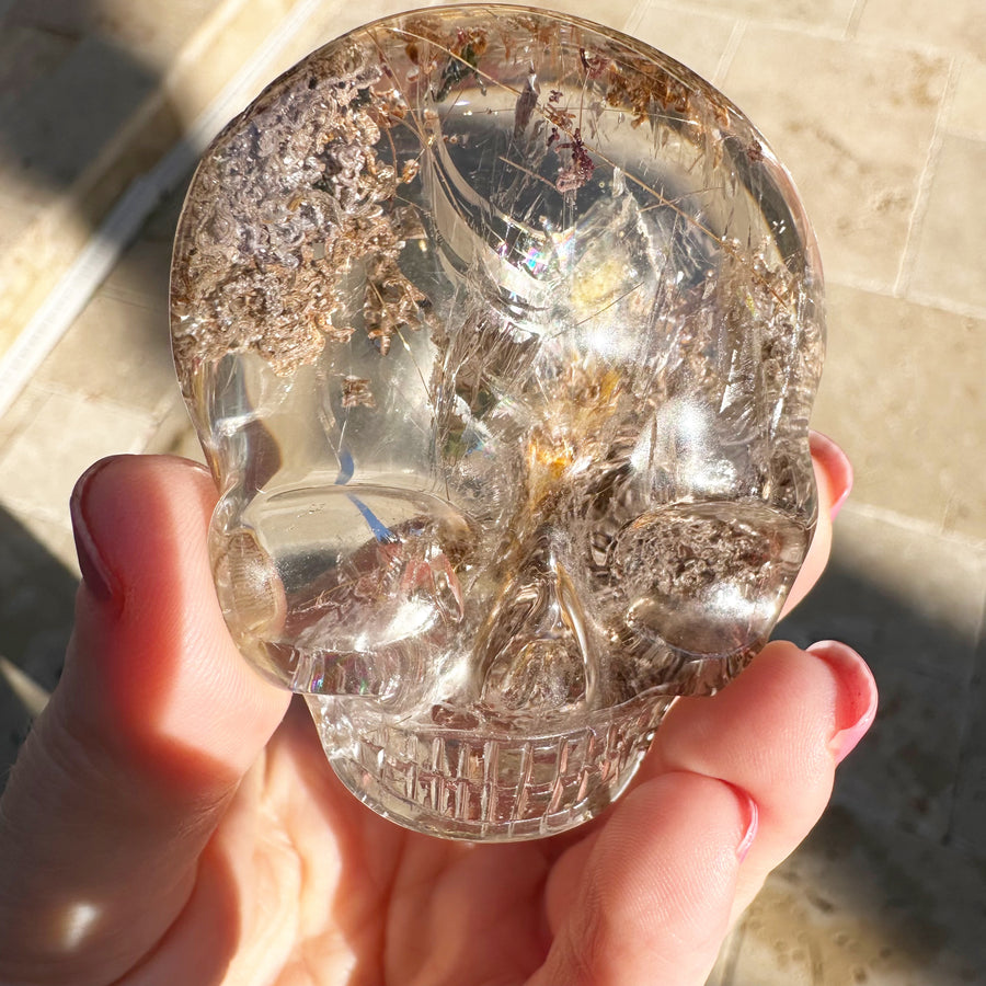 Golden Rutile and Lodolite Quartz Palm Crystal Skull Carved by Leandro de Souza