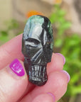 Green Tourmaline Palm Skull by Igor de Souza