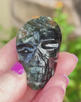 Green Tourmaline Palm Skull by Igor de Souza