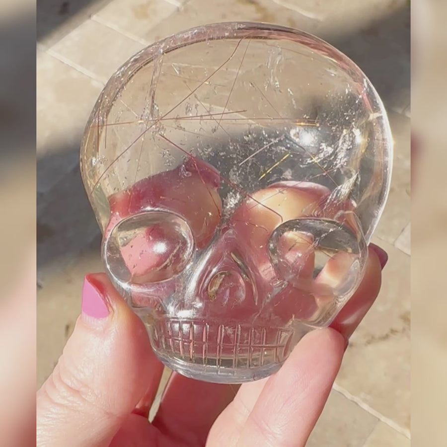 Pink Rutile Quartz Palm Crystal Skull Carved by Leandro de Souza