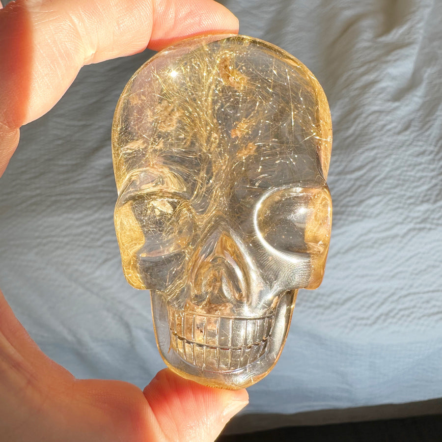 Rutile Citrine Quartz Palm Crystal Skull Carved by Leandro de Souza