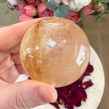 Golden Calcite Crystal Sphere with Rainbows