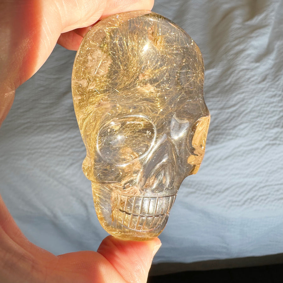 Rutile Citrine Quartz Palm Crystal Skull Carved by Leandro de Souza